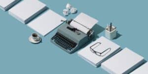 Vintage typewriter header and blank sheets